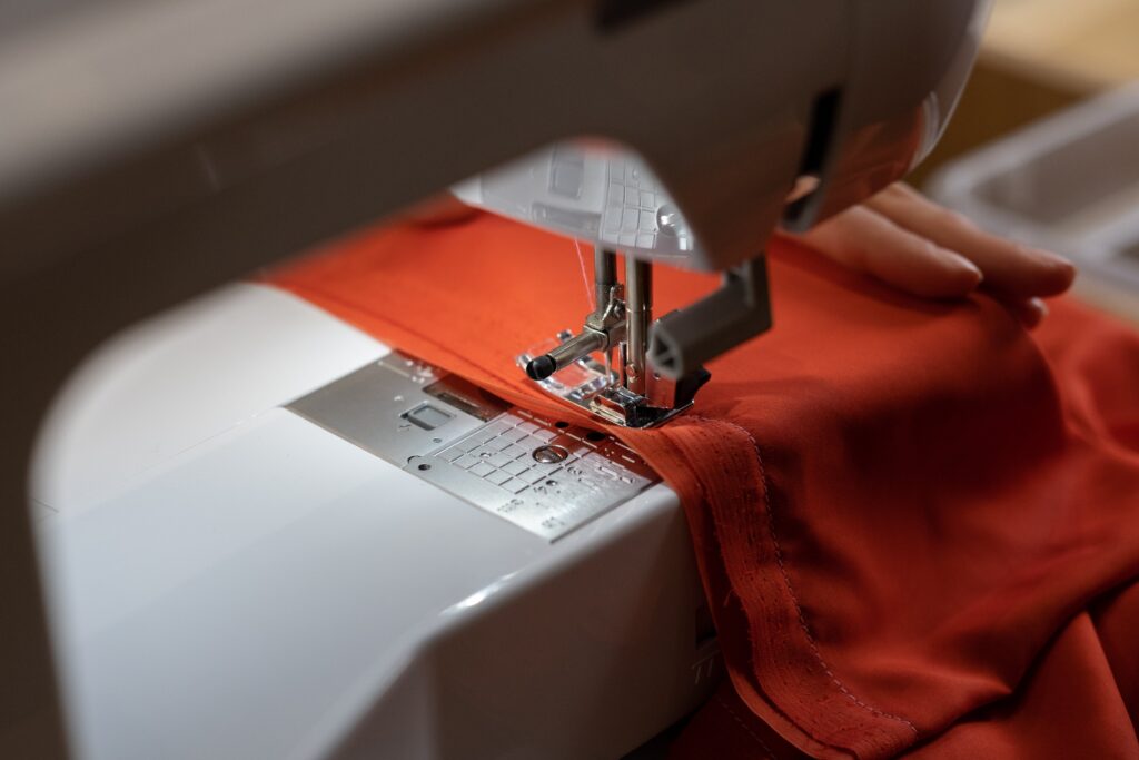 sewing machine with orange fabric